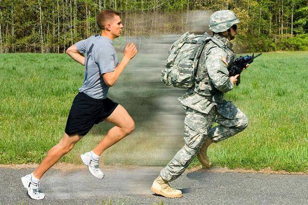 Two men running on a road in the grass.